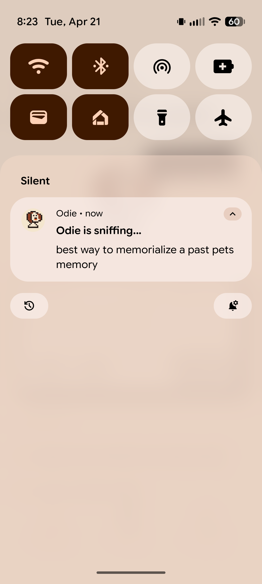 Odie push notification saying 'Odie is sniffing...' with the query text